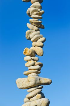 Vertical pile from a sea pebble again