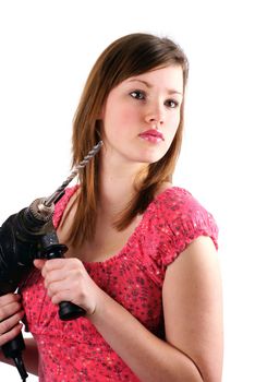 DIY girl, ready to handle a hammer drill; isolated on white.