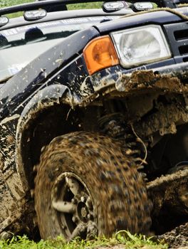 detail of off road wheel with mud