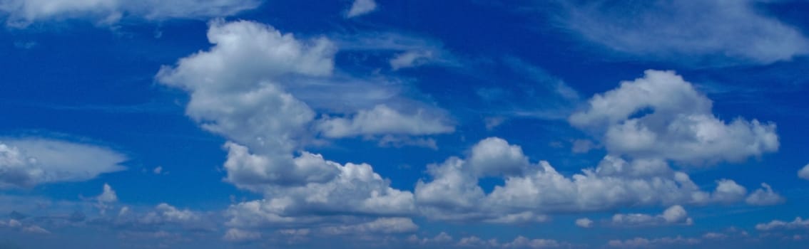 White clouds under blue sky