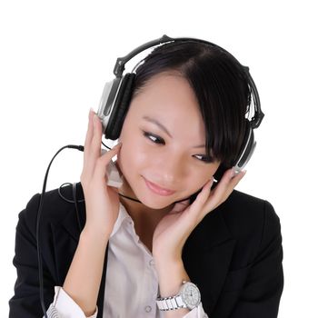 Closeup portrait of business lady listen music by Mp3 player and headphone.