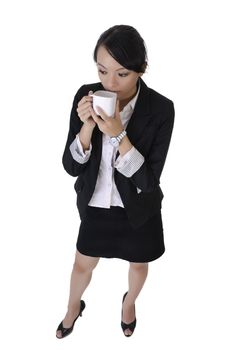 Business woman with cup of coffee with lonely expression, full length portrait isolated on white background.