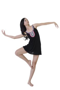 Modern ballet dancer dancing on white studio background.