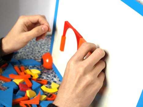 Tangram game toy with hands and magnetic blackboard
