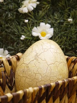 Basket with easter egg floral background