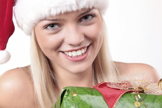 Closeup Portrait Of A Cute Blond Girl With Christmas Present