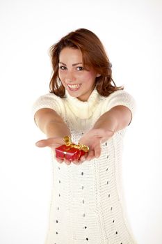 Portrait Of A Beautiful Cheerful Woman Giving A Present