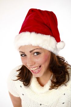 Beautiful Woman Smiling And Wearing A Santa Hat
