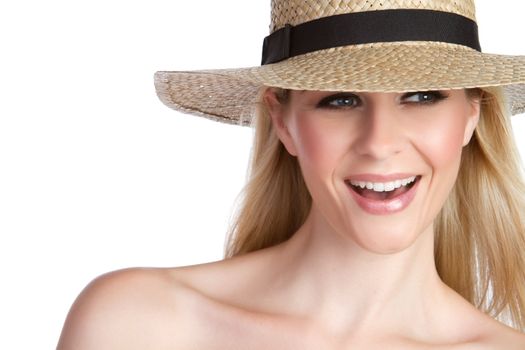 Laughing blond woman wearing hat