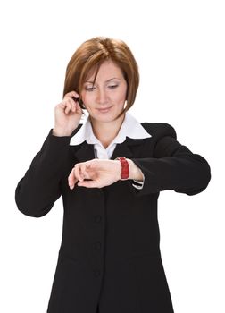 Busy businesswoman checking the time while calling. 