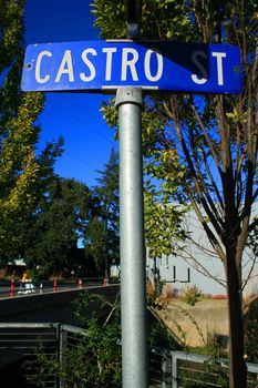 Street sign close up over blue sky.
