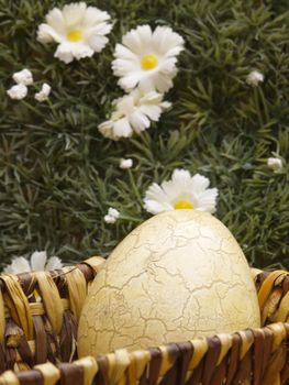 Basket with easter egg floral background