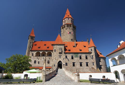 Bouzov Castle (Czech: Hrad Bouzov) is an early 14th-century fortress first mentioned in 1317. It was built on a hill between the village of Hvozdek and the town of Bouzov, 21 km west of Litovel and 28 km northwest of Olomouc, in Moravia, Czech Republic. The castle has been used in a number of film productions lately, including Arabela, Fantaghiro, and Before the Fall. 