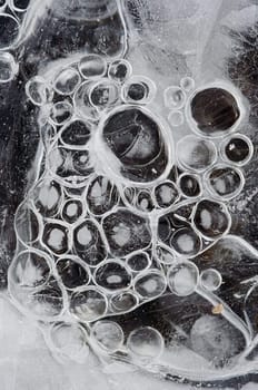 Close-up of the texture of ice - frostbound bubbles like grapes