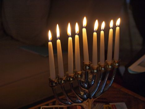 Traditional Jewish Hanukkah menorah with candles with space for your text