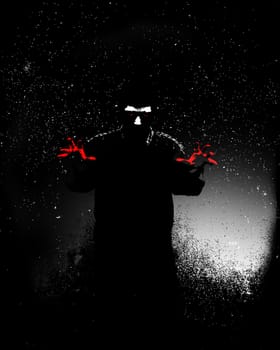 Sinister male figure at night, for Halloween or criminality concepts.