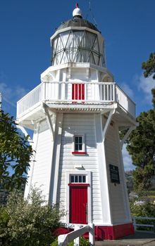 Beautiful wooden Akaroa Lighthouse in Akaroa Bay, New Zeland 