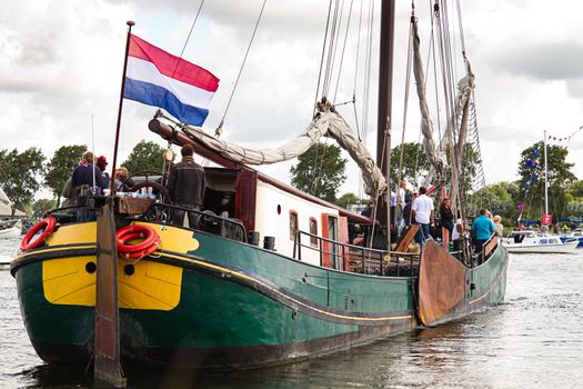 SAIL AMSTERDAM 2010 -IJMUIDEN, THE NETHERLANDS - AUGUST 2010: Sail 2010 starts with the spectaculair Sail-in Parade.  50 Tall ships and more than 500 of  naval ships, replicas and yachts sail in convoy through the North Sea Canal from IJmuiden to Amsterdam. Thousands of private boats accompany the fleet and more than 300.000 visitors watch the parade from the banks. August 19, 2010, IJmuiden, the Netherlands