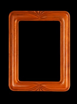 Isolated teak colored carved picture frame against black
