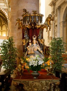 Interior of Sant' Anastasia in Verona showing statue of Mary and Jesus