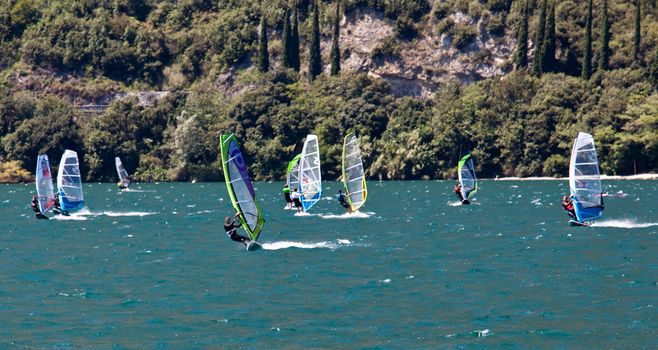 Windsurfer shot against the light on Lake Garda in Italy