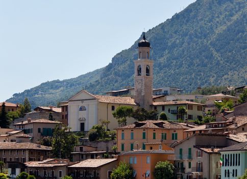 Town church above the rooftops of Limone on Lake Garda Italy