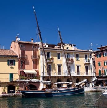 Sailing boat in the harbor of Malcesine on Lake Garda