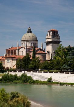 River Adige in Verona, Italy with old church on bank