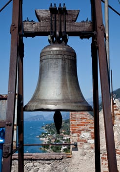 Bell on top of castle tower in Malcesine on Lake Garda