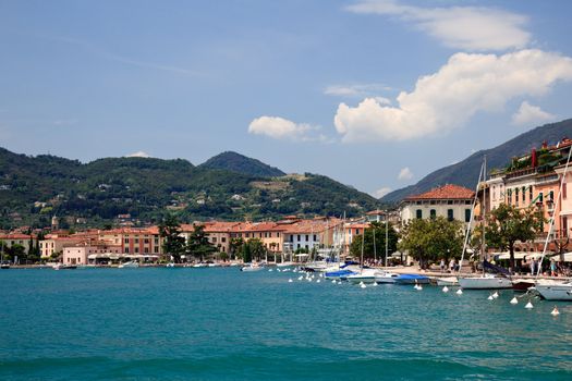 Town of Salo on Lake Garda showing harbor and boats moored