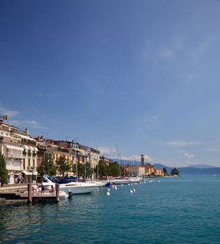 Town of Salo on Lake Garda showing harbor and boats moored