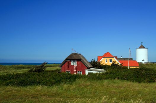 A danish village with houses and view to the ocean