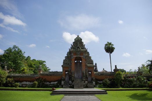 This is the big entrance in brik and stone of a Balinese temple
