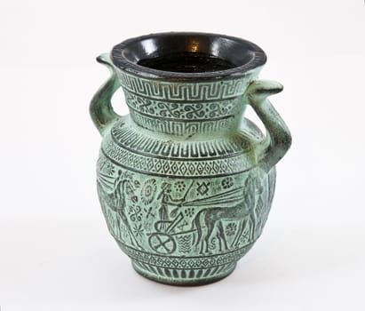 Little greek pottery on awhite background
