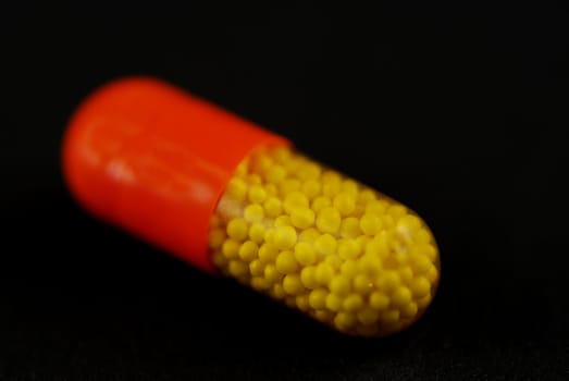pictures of capsule pills showing the medicine inside it