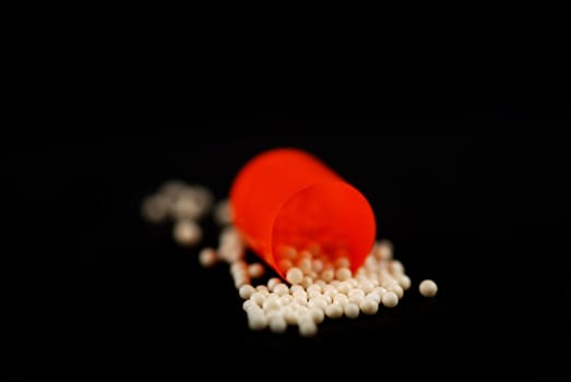 pictures of capsule pills showing the medicine inside it