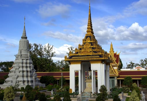 View of stupas in the Royal Palace garden in Phnom Penh city in Cambodia