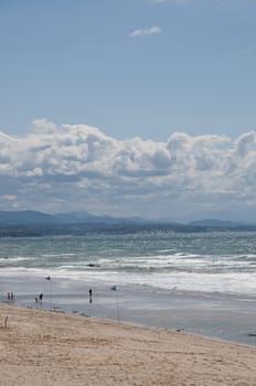 Beach, sea and blue sky with some clouds, it's a summer day