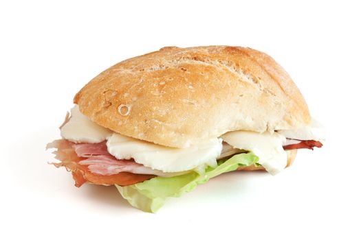 loaf of bread with jam, speck mozzarella and lettuce isolated on white background