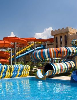 Aqua park in the open air.
Summer, sunny day.