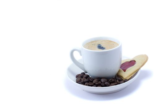 Cup of coffe with cookie and granules
