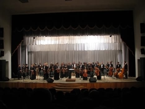 Symphonic orchestra, concerto, symphony, music instruments, people, troupe, scene, appearance, musician, sound, curtain