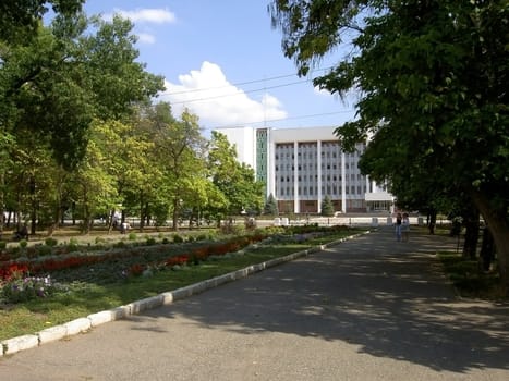 Park, white house, central area, verdure, tree, blue sky, cloud, garden, place for walks and rest, summer, day, city, flowerbed, flowerses, path