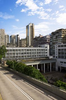 traffic road and building at day in hong kong