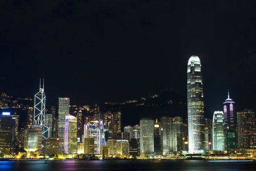 hong kong at night and modern buildings