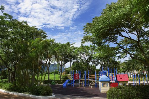 Children's playground in the park and blue sky