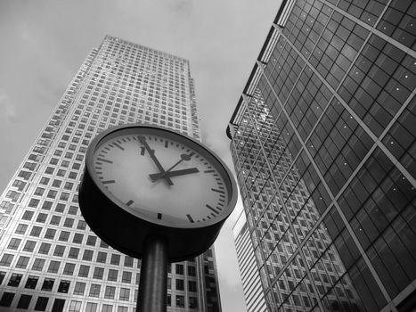 Concept image representing time and business. Taken next to Canary Wharf in London's Docklands.