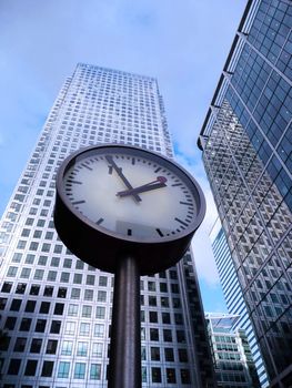 Concept image representing time and business. Taken next to Canary Wharf in London's Docklands.