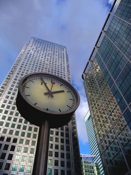 Concept image representing time and business. Taken next to Canary Wharf in London's Docklands.