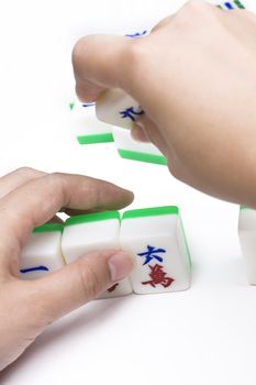 Mahjong, very popular game in China on white